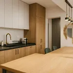 Апартаменти Qult - Urban Oasis
